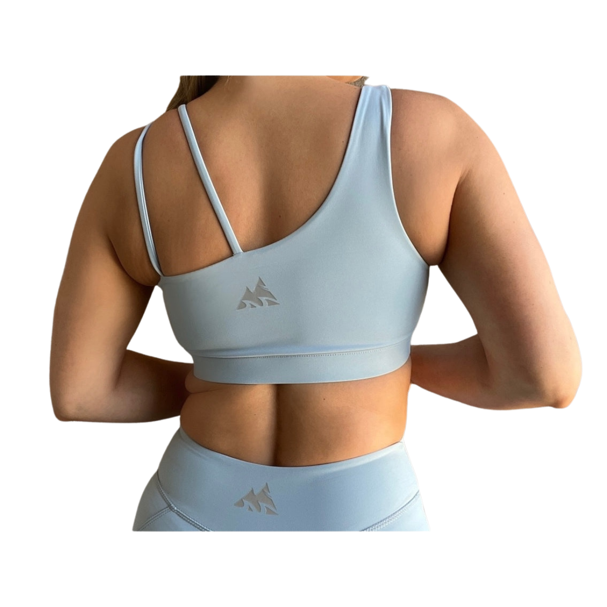 Dusty blue asymmetrical sports bra with one thick strap and two thinner straps