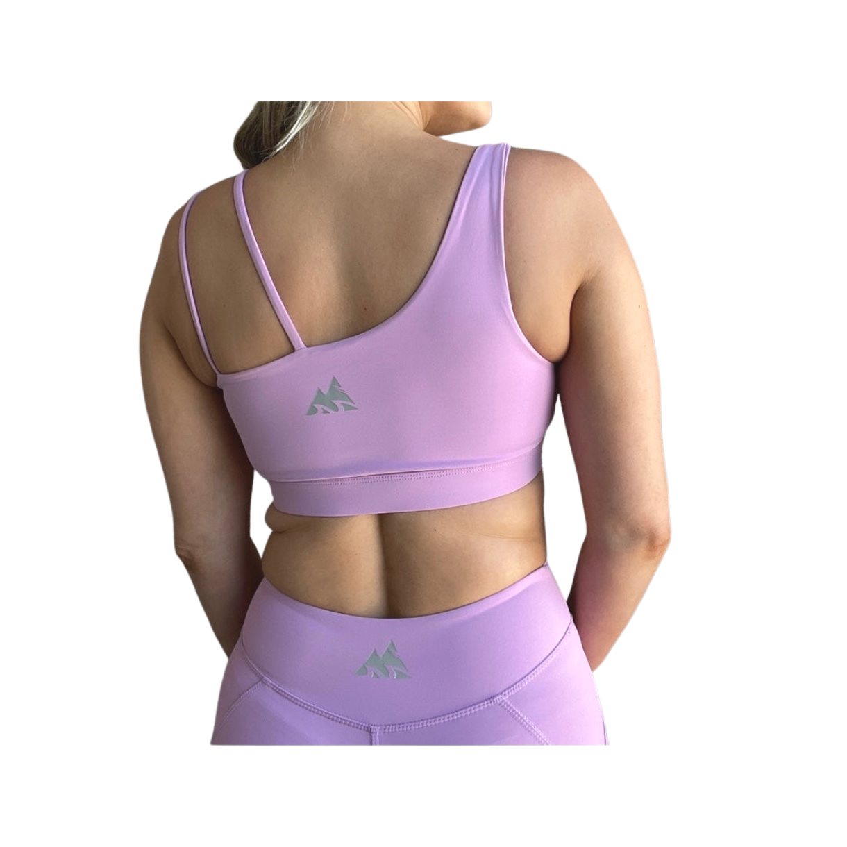 Lavender asymmetrical sports bra with one thick strap and two thinner straps