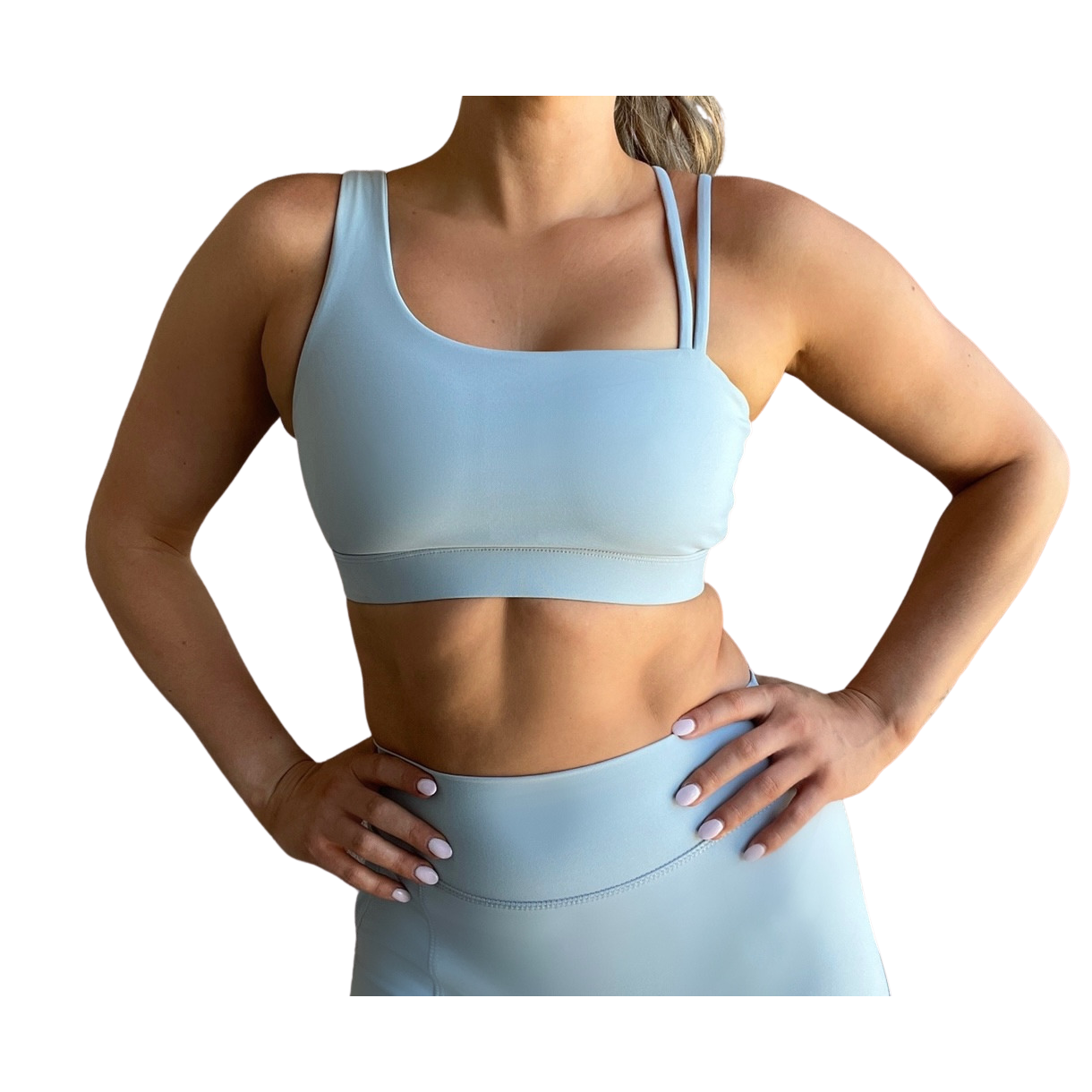Dusty blue asymmetrical sports bra with one thick strap and two thinner straps