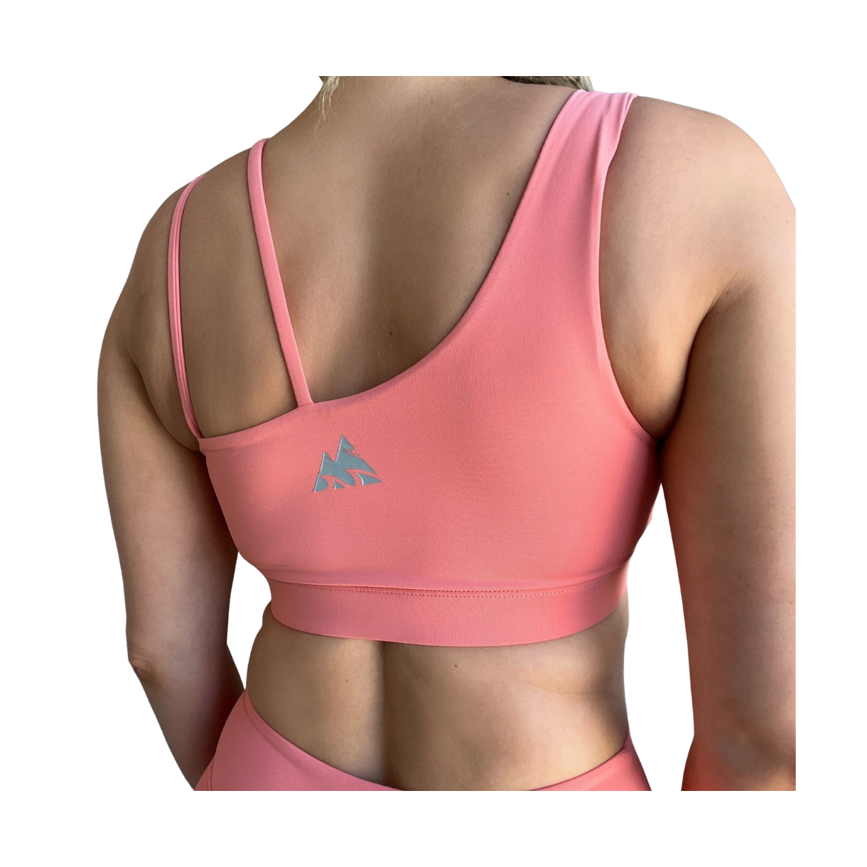 Coral asymmetrical sports bra with one thick strap and two thinner straps