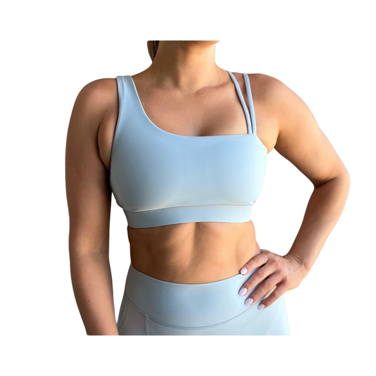 Dusty blue asymmetrical sports bra with one thick strap and two thinner straps