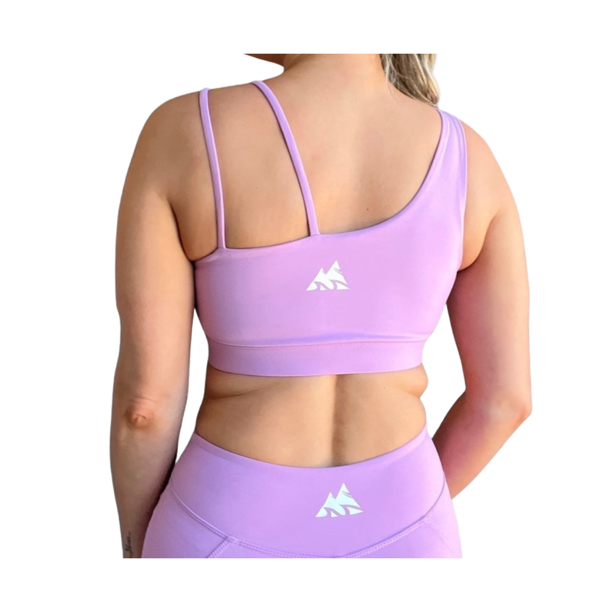Lavender asymmetrical sports bra with one thick strap and two thinner straps